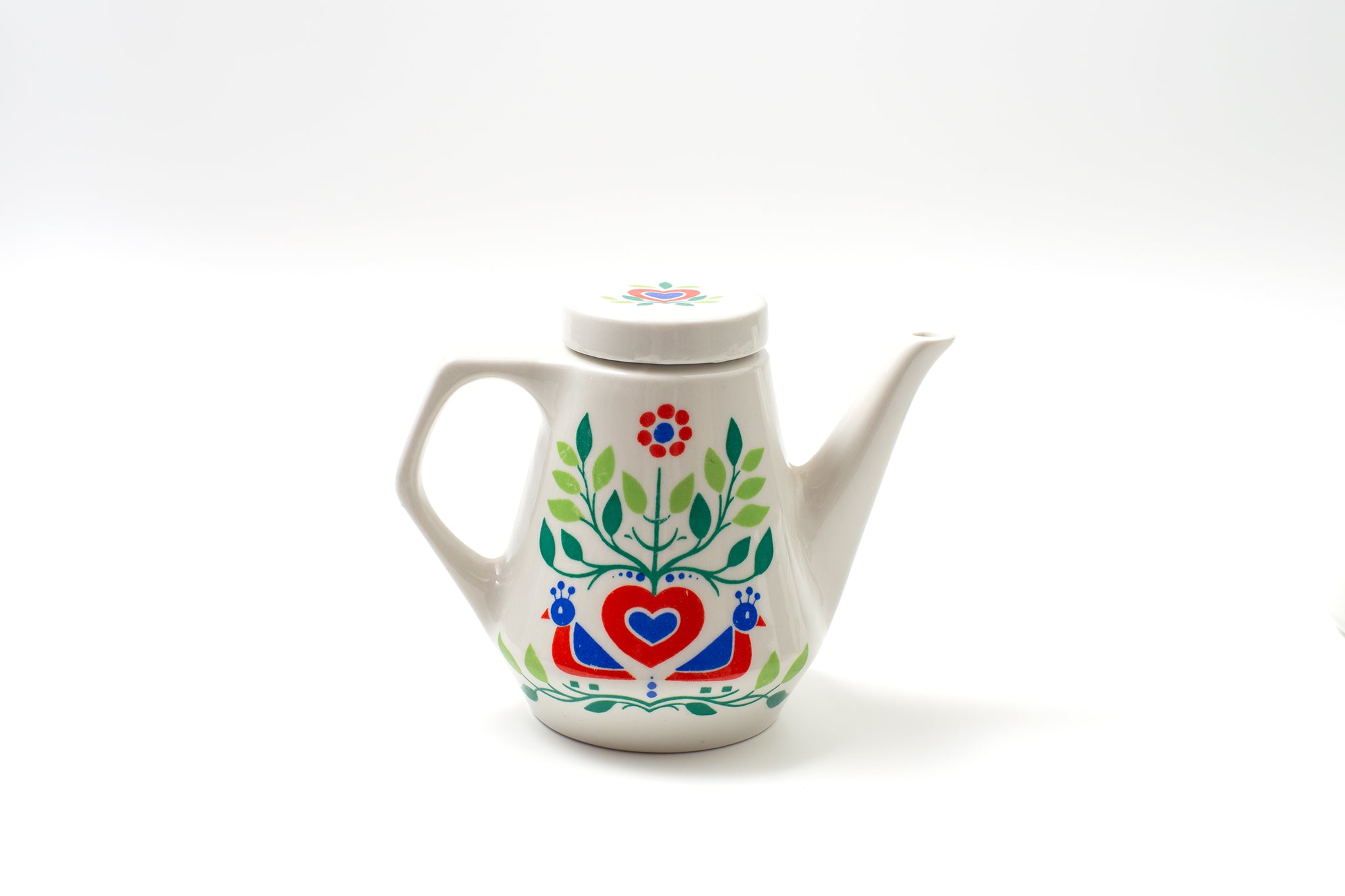 1970年代から80年代ドイツのDr. Oetker社製ヴィンテージ・ティーセット。鳥とハートのレトロなイラストが描かれたティーポット、シュガーポット、クリーマー、カップ、ソーサーのセット。